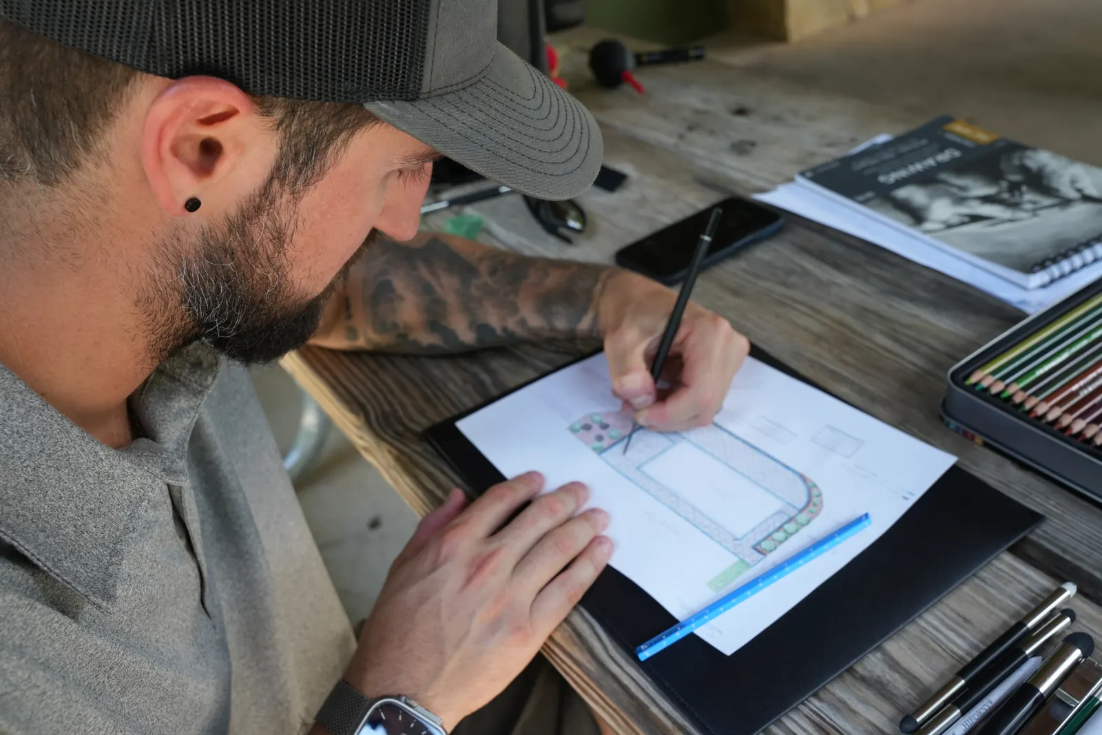 Jacob drawing a plan